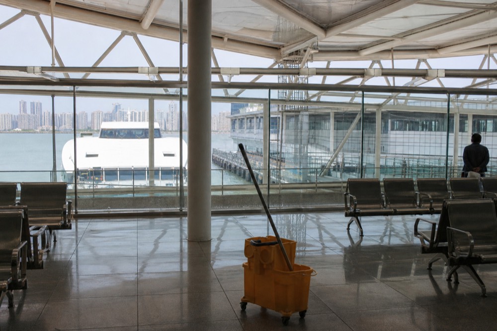 Ferry terminal concourse with a high-speed ferry at the berth