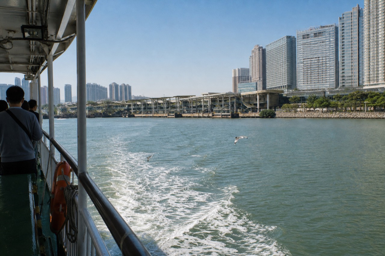 Ferry crossing the harbour between Hong Kong and Macau at midday