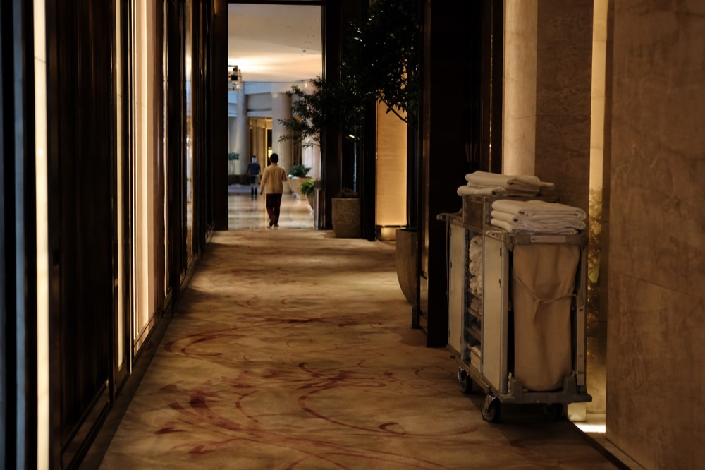 Hotel lobby corridor inside a Cotai Macau integrated resort at night