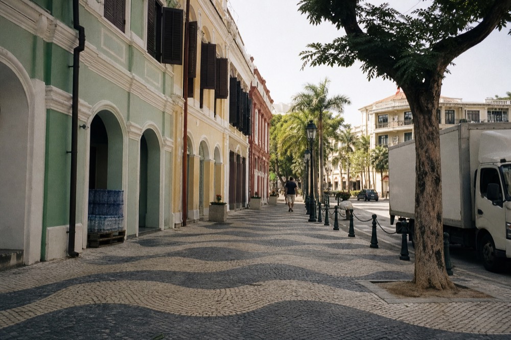Portuguese colonial facade and cobbled square in Macau old town