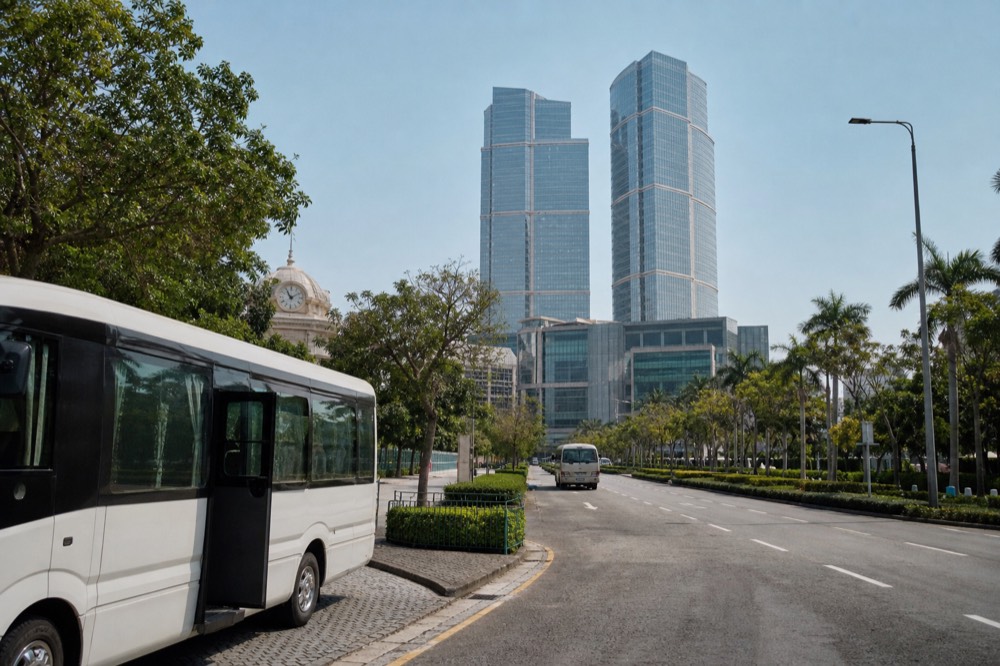 Hotel towers of the City of Dreams resort in Cotai Macau seen across the surrounding streets