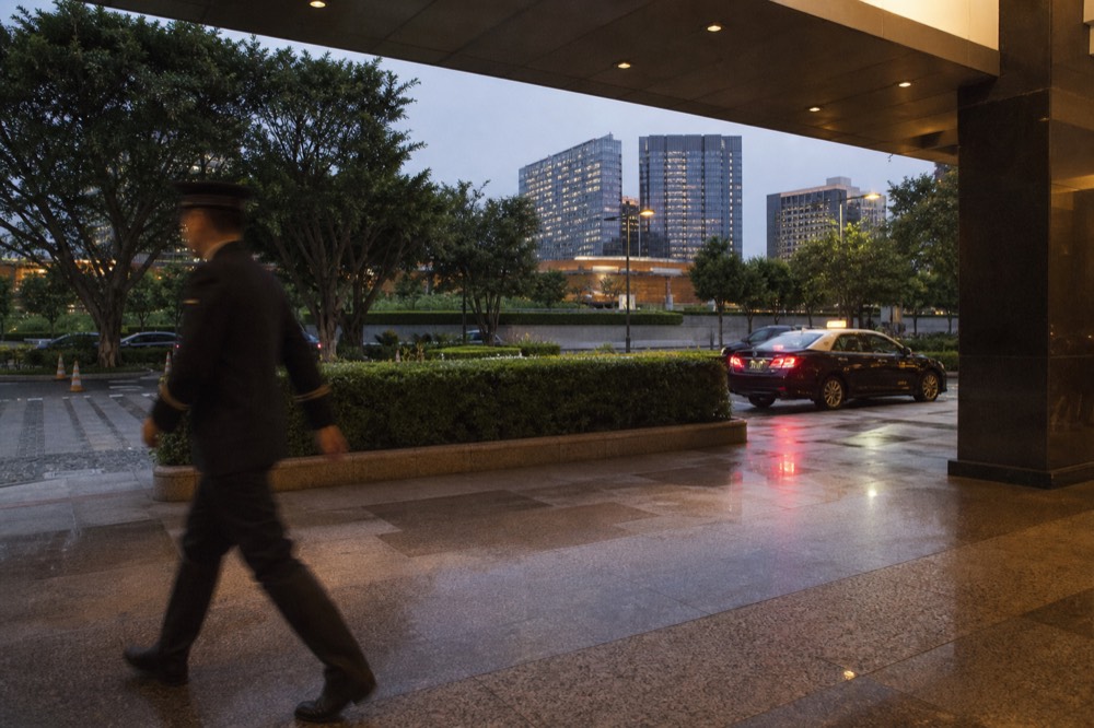 The northeast entrance of City of Dreams Macau at street level in the evening