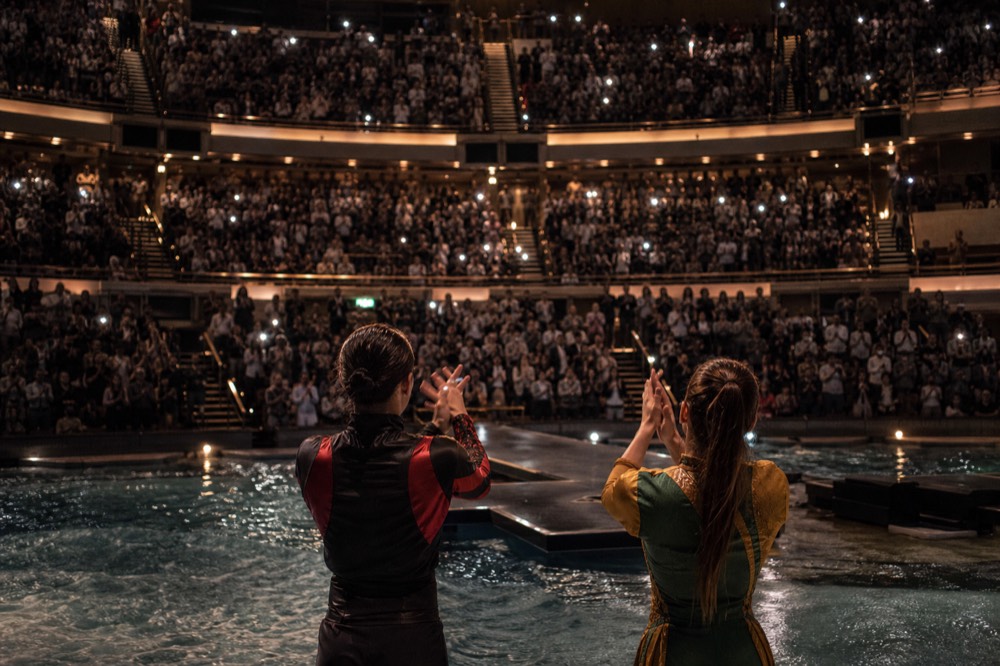 A full house applauding at the end of a House of Dancing Water performance