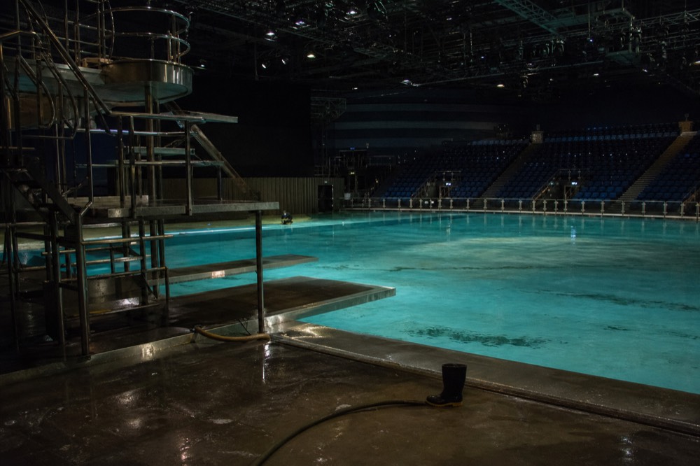 The stage pool of the Dancing Water Theatre lit before curtain