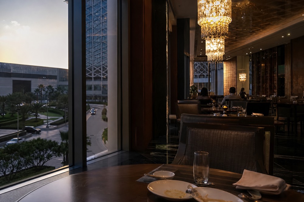 Fine dining restaurant interior with chandeliers