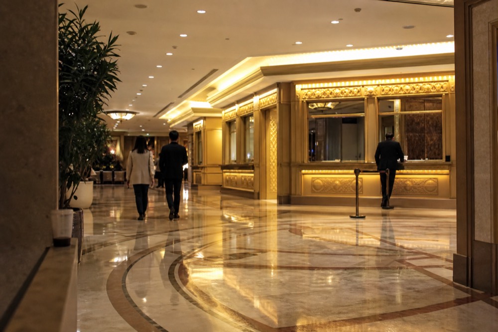 The theatre foyer entrance with cloakroom and concession area before a performance