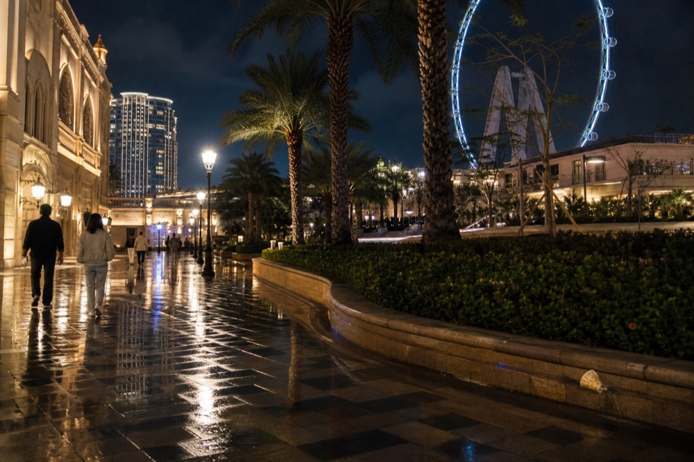 Night view of a Cotai resort theatre district with illuminated walkways